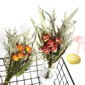 Beautiful dried flower bouquet with mixed roses and eucalyptus leaves for home decor gifts.