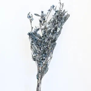 Preserved blue butterfly flower dried flowers for wedding decor detail shot close up floral arrangement