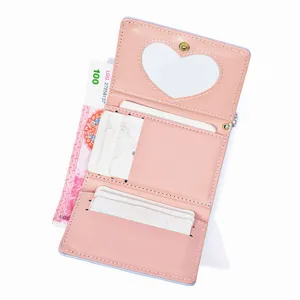Cute pink trifold wallet for women with card slots and heart mirror, compact minimalist style.