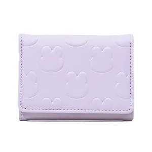 Cute Japanese style light purple trifold wallet for women featuring embossed rabbit design.