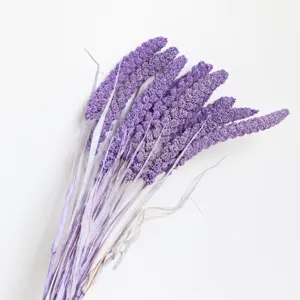 Closeup of purple dried millet flowers bouquet, rustic aesthetic for home decor and props.