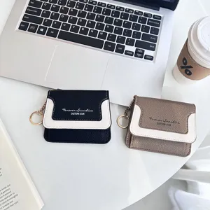 Mini two-tone coin purse with keychain, PU leather minimalist wallet for women and girls.