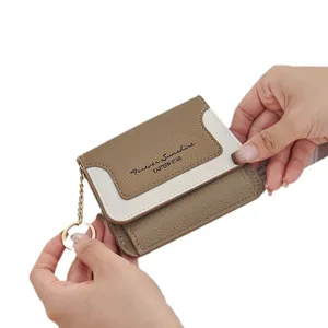 Mini contrast color coin purse wallet with metal key ring for women fashion daily use.