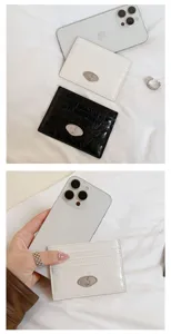 Minimalist Korean style card holder detail showcasing multi-color compact credit card wallet.