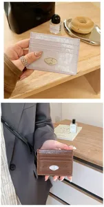 Korean style minimalist PU leather card holder, compact multi-slot wallet for women daily use.