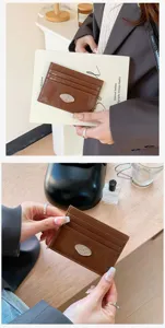 Detailed view of stylish Korean minimalist faux leather card holder with chic metal emblem.