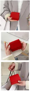 Rote Damen Geldbörse aus Leder, kurzes Kartenetui mit Klappe und goldener Hardware.
