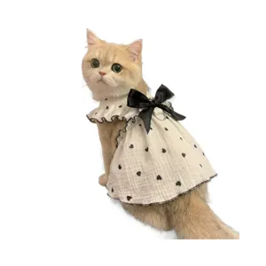 Cute summer cat dress with black hearts, bow, ruffles, and leash ring for small dogs.