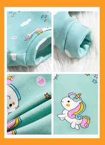 Cute unicorn pet hoodie detail, mint green milk velvet puppy clothes macro shot.