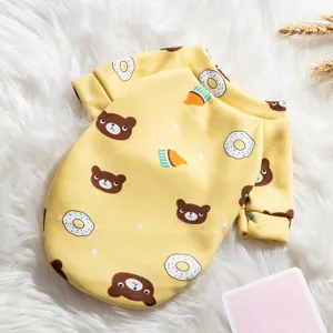 Cute cartoon bear pattern pet sweater detail view, soft milk velvet fabric for cats and dogs.