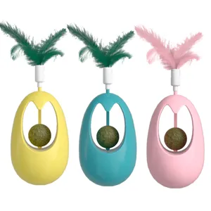 Interactive cat toy tumbler with feathers and mint ball, cute pet supplies for kittens play.