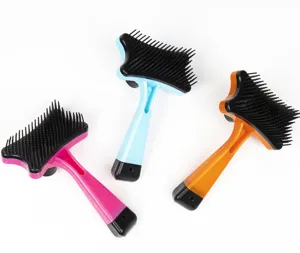 Pet grooming brush detail showing dense black teeth and colorful handles for cat and dog care.