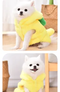 Close-up details of the cute yellow pineapple pet costume, warm winter apparel for small dogs.