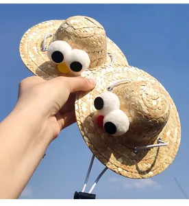 Cute pet straw hat with funny googly eyes, ideal for cats and small dogs summer outdoor wear.