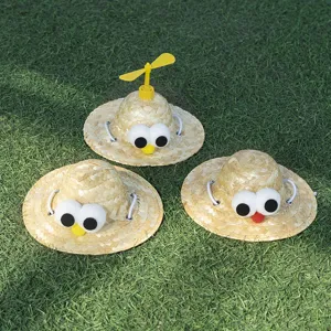 Cute pet straw hat with propeller and big eyes for cats and small dogs, outdoor photo prop.