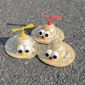 Cute pet straw hat with bamboo dragonfly propeller and big funny eyes for small dogs and cats.
