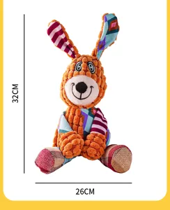 Cute plush dog squeak toy with textured design and colorful patchwork ears for pets.