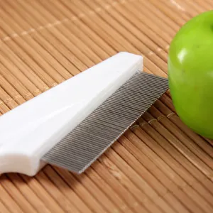 Pet flea comb with stainless steel fine teeth and durable white handle for grooming pets.