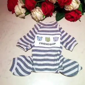 Cute striped dog pajamas soft comfortable pet jumpsuit with lovely cartoon animal chest patch.