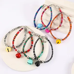 Colorful woven pet collar with bell and adjustable chain for cats and dogs, stylish design.