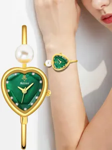 Women heart shaped green dial watch luxury pearl bracelet quartz gold wrist watch for ladies.