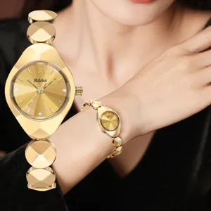 Elegant gold quartz watch for women featuring a unique shaped bracelet and shiny dial.