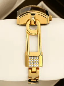 Luxury gold quartz watch for women with diamond lock bracelet detail, elegant fashion timepiece.