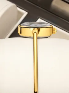 Elegant gold bangle women quartz watch with faceted crystal glass, slim sleek bracelet strap design.
