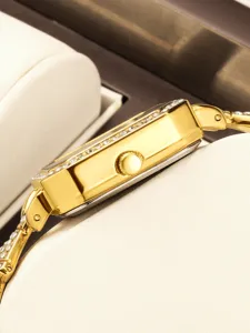 Detailed side profile view of luxury gold rectangular women watch featuring sparkling diamond bezel.