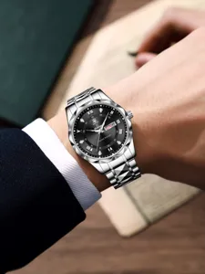 Herren Business Quarzarmbanduhr mit Metallarmband, schwarzem Zifferblatt und Kalenderanzeige.