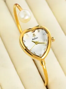 Elegant women's heart-shaped dial pearl bangle watch, golden quartz fashion wristwatch.