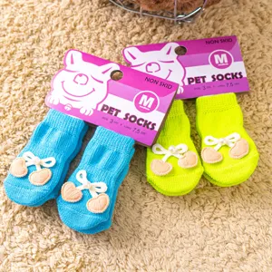 Cute small dog pet socks with anti-skid design, breathable knit booties for cats and small dogs.