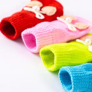 Colorful knitted pet socks for small dogs and cats, anti-slip and warm winter foot covers.