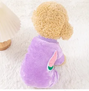 Close-up of a cute purple plush dog jumpsuit featuring a sweet watermelon detail on the back.