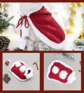 Pet Christmas cape detail showcasing soft red velvet fabric and cute white plush trim.