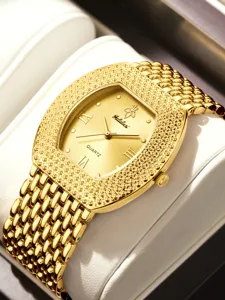 Golden tonneau quartz watch with dazzling paved rhinestones on dial and bezel, metal mesh strap.