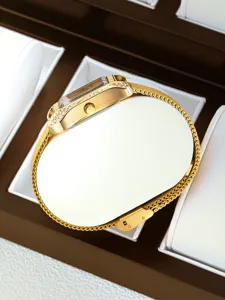 Elegant gold square rhinestone women quartz watch with mesh strap detail view showcase.