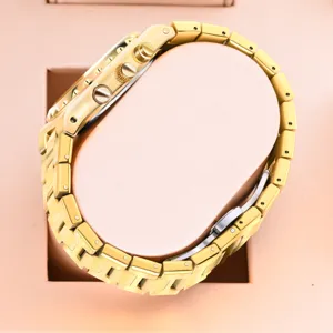 Gold-toned men's quartz watch with integrated bracelet style and chronograph pushers