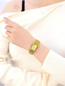 Elegant square women quartz watch with sparkling rhinestones and gold mesh strap style.