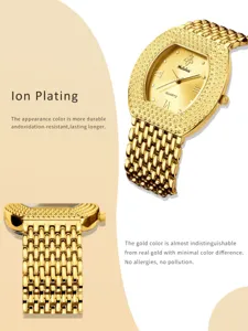 Luxury gold tonneau quartz watch for women with sparkling rhinestone bezel and mesh strap.