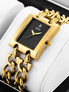 Yalalusi Gold Quarz Armbanduhr mit schwarzem Zifferblatt und klobigem Kettenarmband.