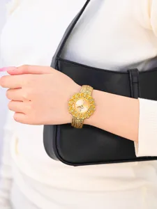 Luxury gold women watch with rhinestone floral dial and textured leather strap for daily wear