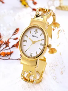 Luxury gold women quartz watch with elegant bracelet strap rhinestone bezel oval dial fashion.