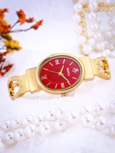 Elegant gold oval women watch with striking red dial and sparkling rhinestone bracelet details.