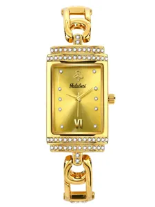 Detailed close-up of the luxurious gold-tone square quartz watch with dazzling rhinestones.