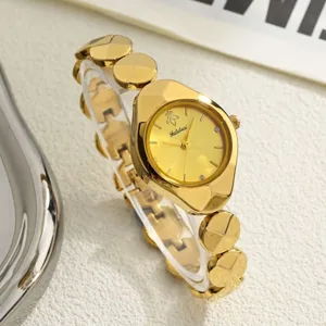 Exquisite women's gold watch detail, luxury link bracelet design and clear dial for daily wear.