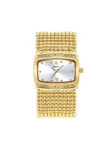 Detailed view of luxury gold rhinestone women watch, sparkling crystal bezel, beaded strap.