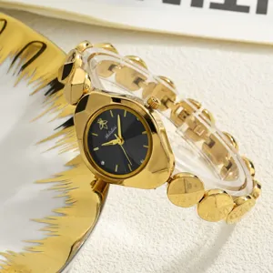 Luxury gold women's watch with black dial and metal chain strap, elegant fashion timepiece.