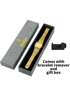 Vue détaillée de la montre carrée dorée luxueuse présentée en coffret avec outil de bracelet.