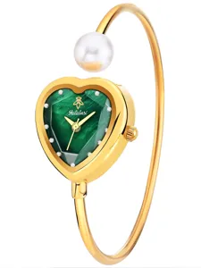 Elegant women quartz watch with heart green dial and pearl bangle gold bracelet design.